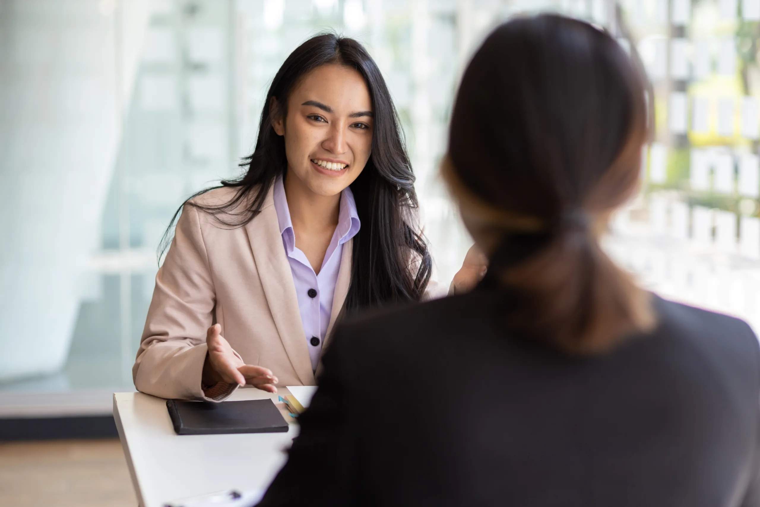 Businesswoman,Discussing,With,Colleagues,In,The,Office,,Job,Interview. Legal_2